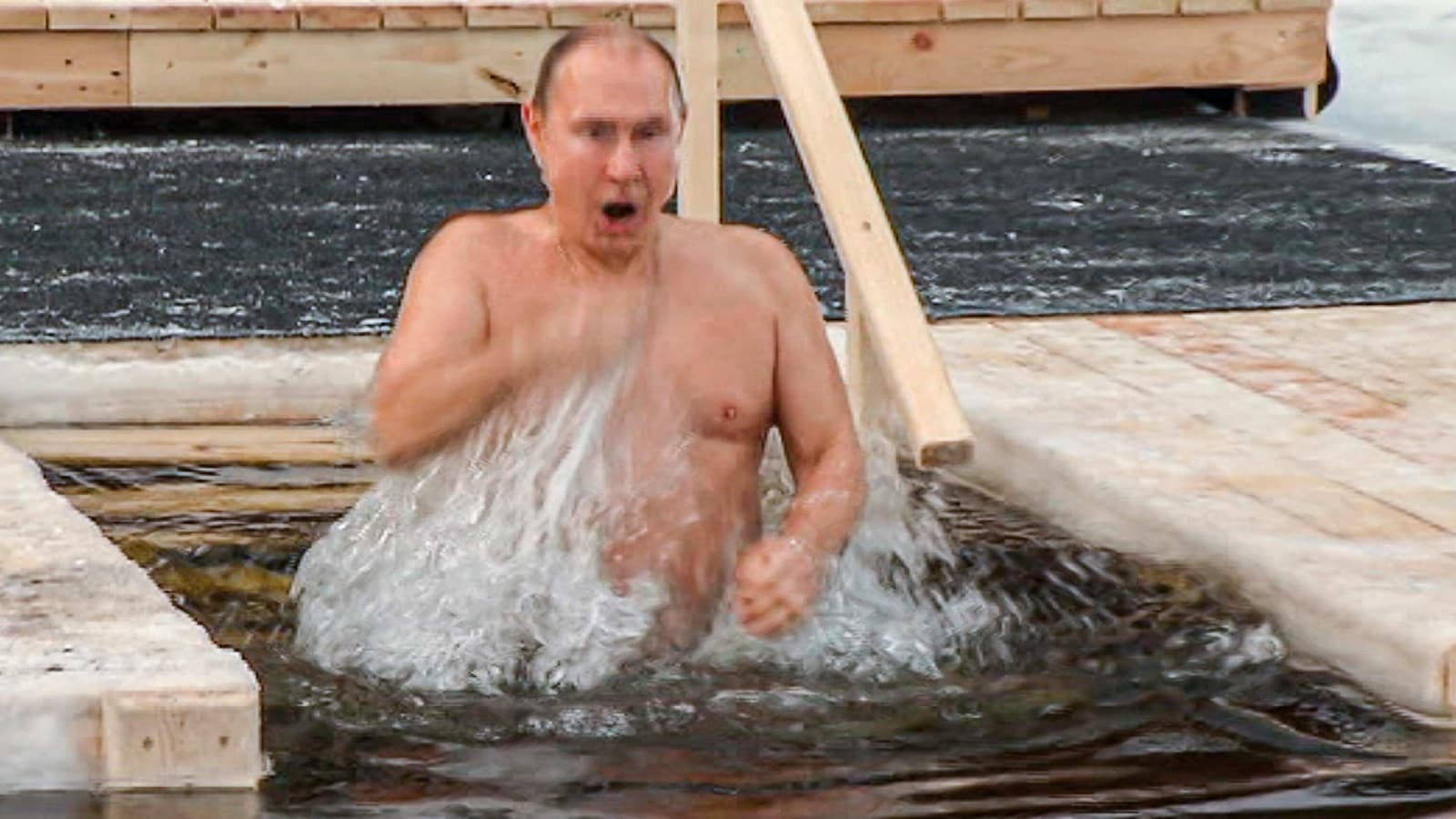 Putin Takes Icy Plunge for Religious Celebration in Russia