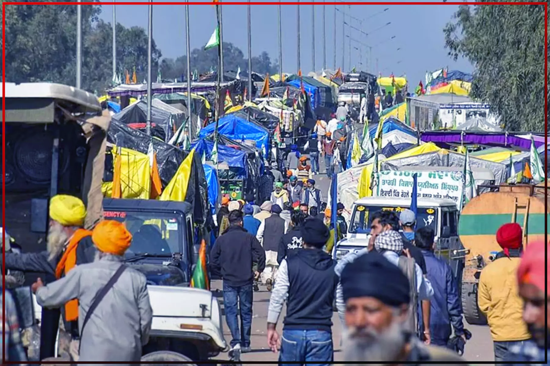 Farmers Protest by parking their tractors and blocking the highway and roads linking Delhi.